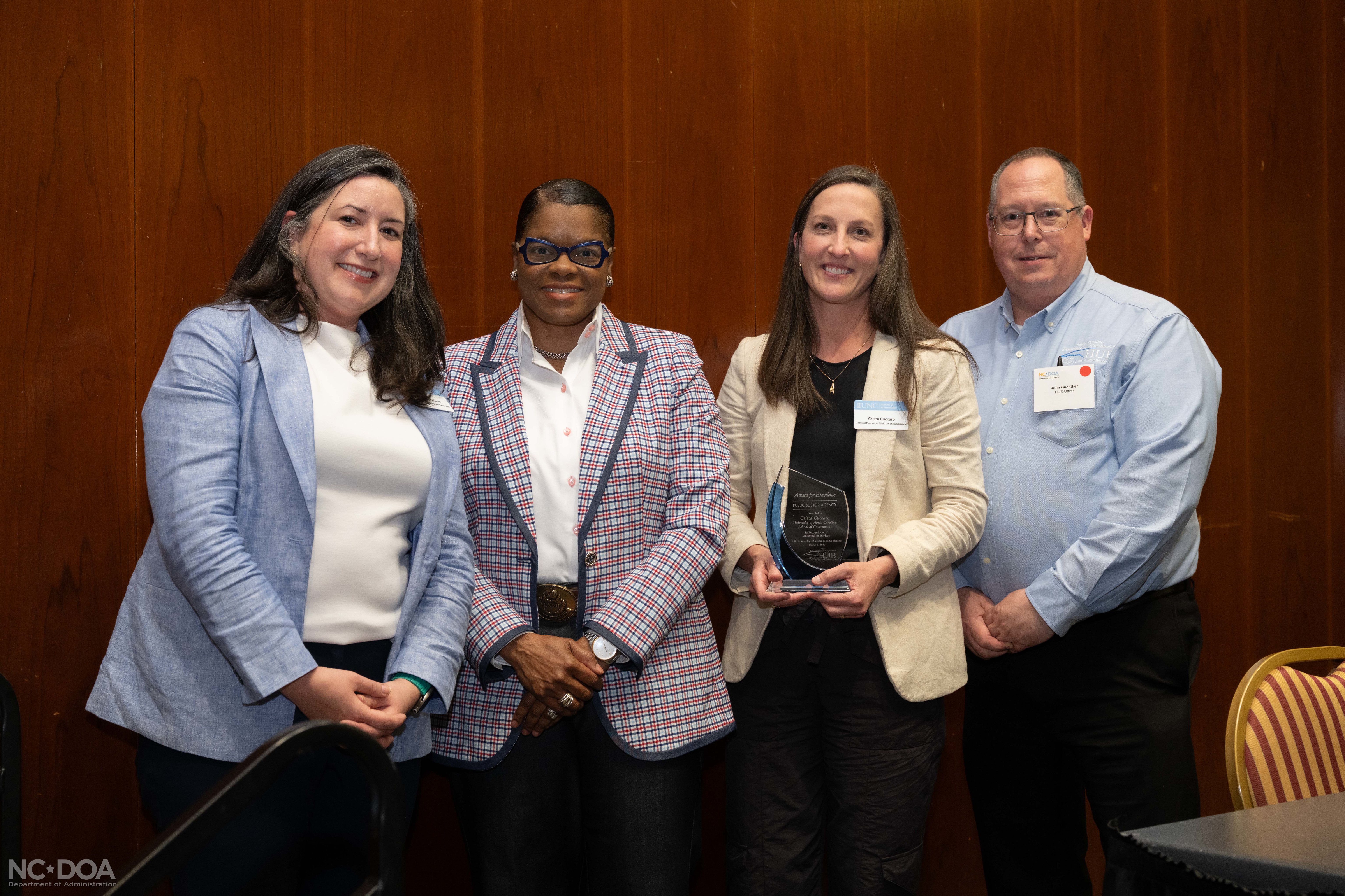 Pictured left to right: Associate Dean for Strategic Communications and Partnerships Sonja Matanovic, Director/Assistant to the Secretary for HUB Outreach Alicia Lyon, Assistant Professor of Public Law and Government Crista Cuccaro, and Assistant Director
