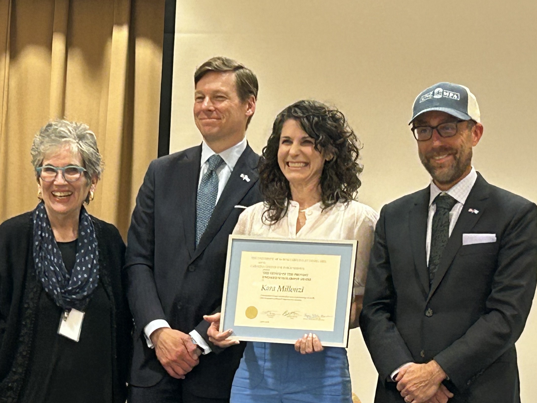 Kara Millonzi poses with (on the left) Lynn Blanchard, Lee Roberts, and Magnus Egersted (on the right)