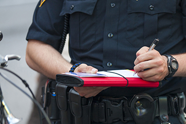 Law enforcement officer writes a ticket