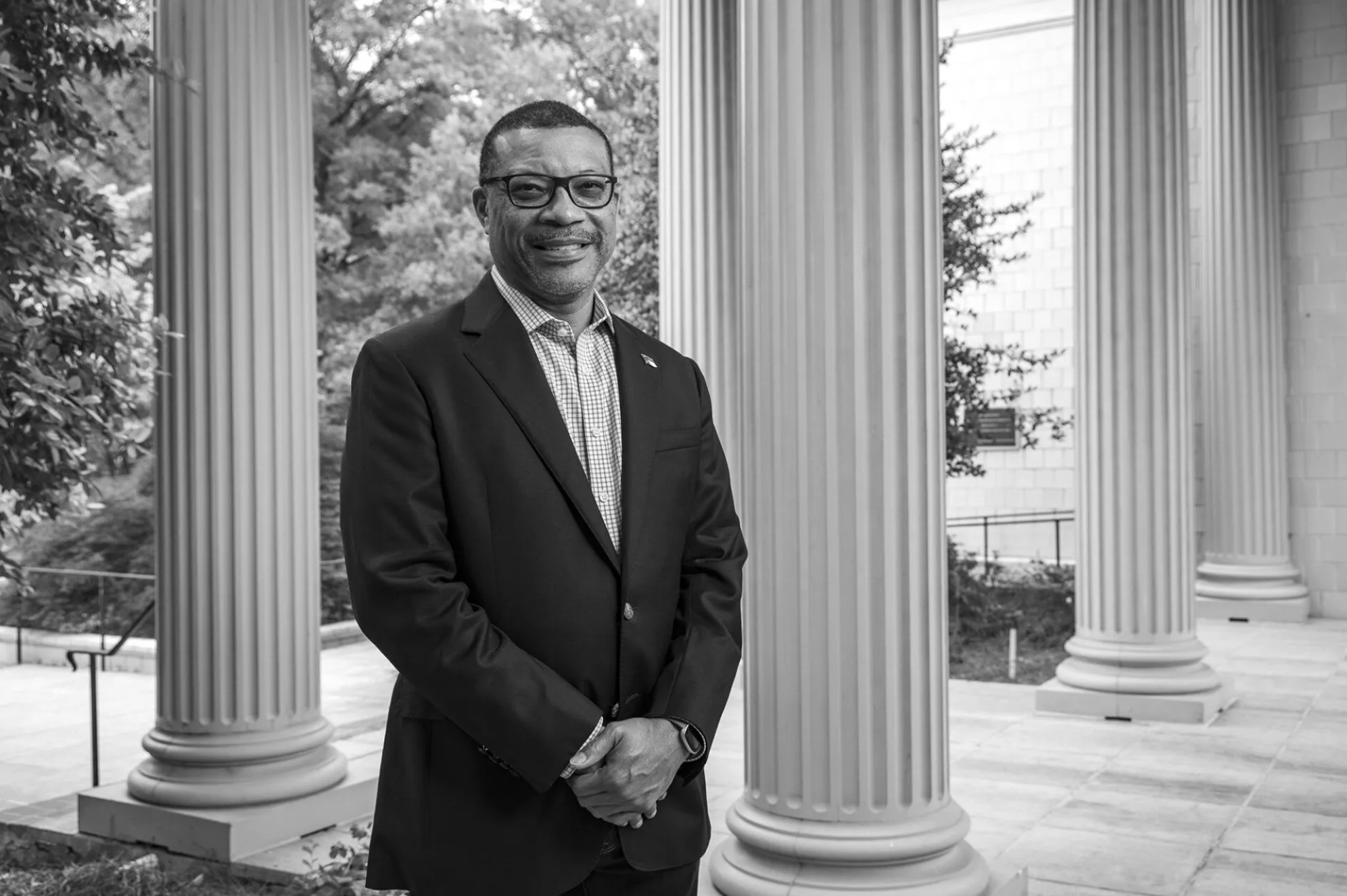 Faculty member Jonathan Morgan pictured in front on the Knapp-Sanders Building