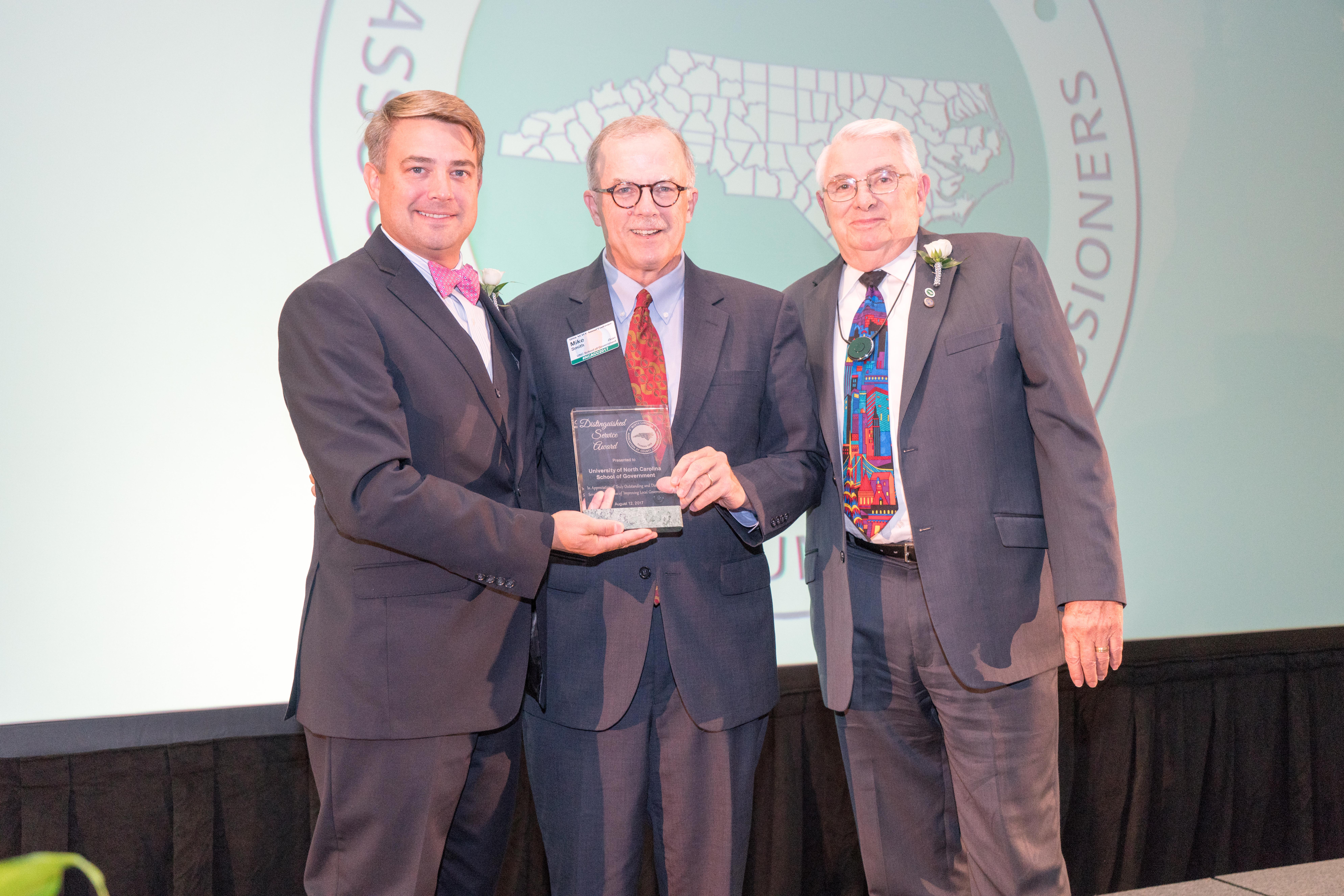 NCACC 2017 Annual Conference President's Banquet Dean Mike Smith accepts the Distinguished Service Award from the NC Association of County Commissioners