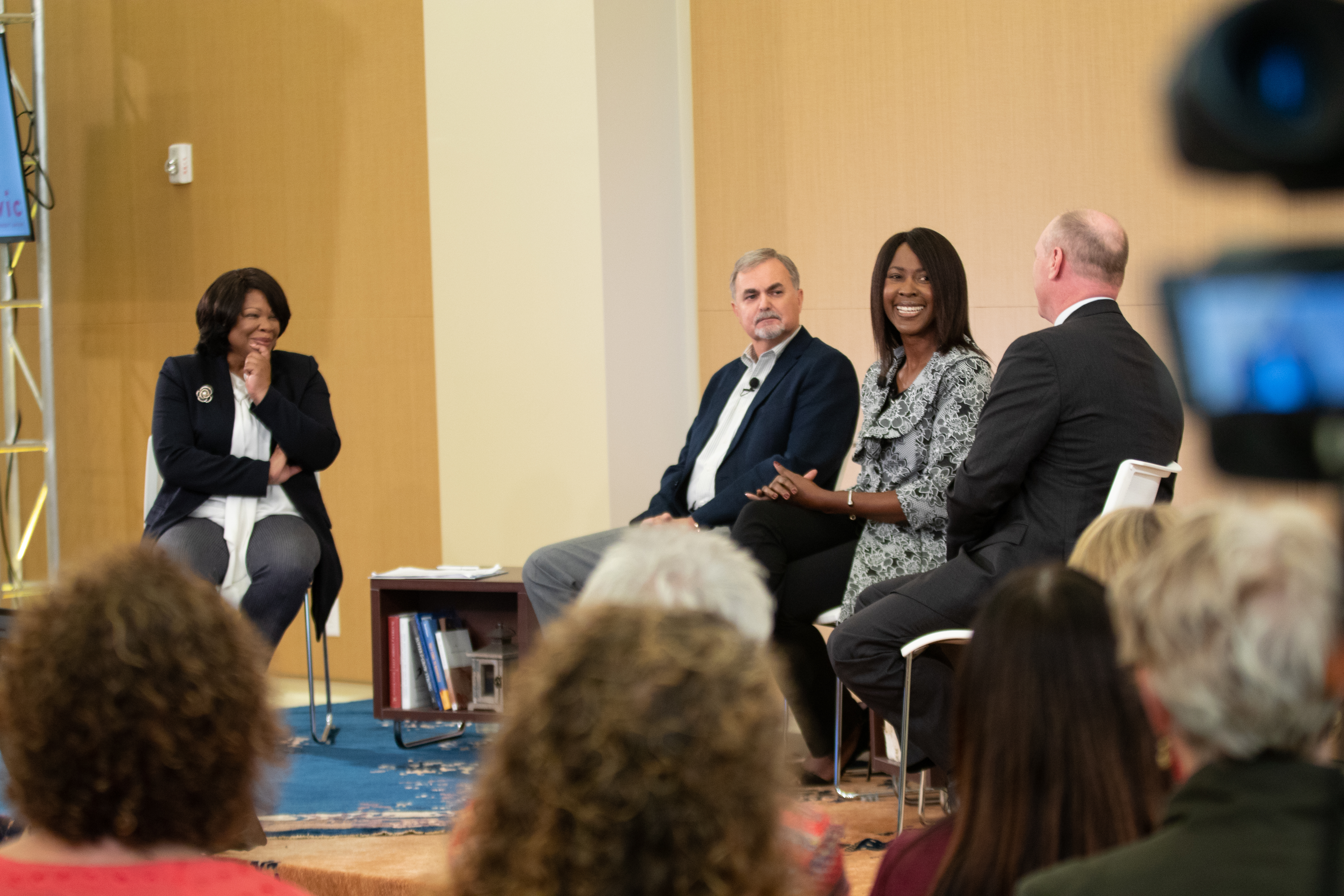 Panelists discuss a topic at a town hall meeting in Shelby, North Carolina.