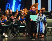 Richard Stevens receives the Distinguished Alumnus Award at University Day October 12, 2017. 