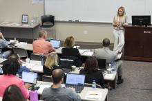 Shannon Tufts teaches a full classroom of professions at the Knapp-Sanders building in 2019.