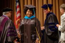 UNC MPA Student in Graduation Robes at Commencement Ceremony